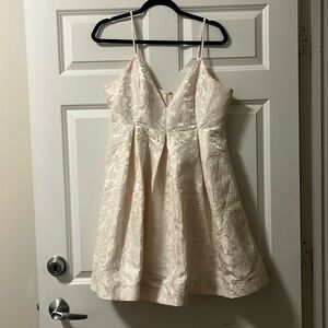 Francesca’s Cream Brocade Empire Waist Mini Dress